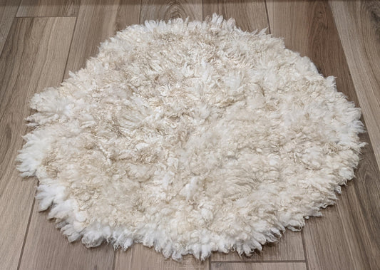 Medium cream rug